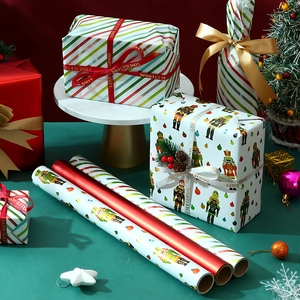 Christmas gift wrapping paper set featuring nutcracker patterns and red metallic finish