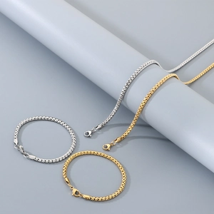 Detail of gold and silver stainless steel box chain necklace and bracelet jewelry sets