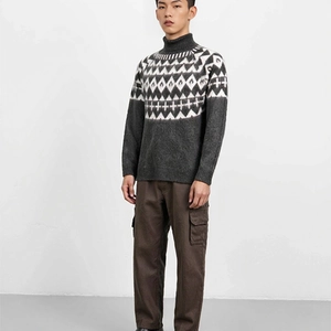 Front view of men's turtleneck sweater featuring geometric diamond pattern and slim fit