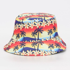 Tropical sunset print bucket hat with palm trees and floral pattern detail for outdoor sun protection