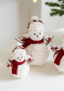 Detailed view of plush snowman set with knitted hats and textured fabric for Christmas decor