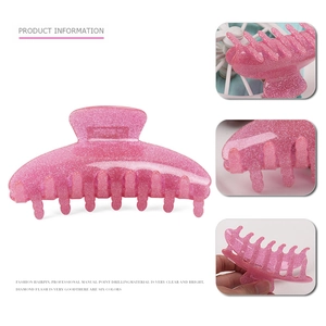 Pink glitter acrylic shark hair claw clip for women shown in multiple professional angles