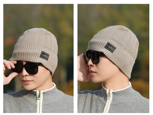 Detailed knit texture and FARDI brand logo patch on warm winter beanie for men