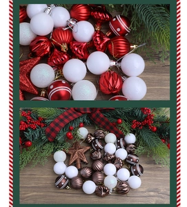 Close-up of assorted red, white, and brown Christmas tree ornaments on a wooden background