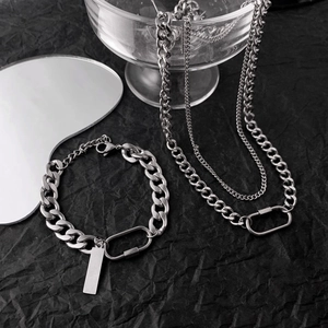 Cuban link bracelet and necklace set with oval carabiner and metal tag in silver steel