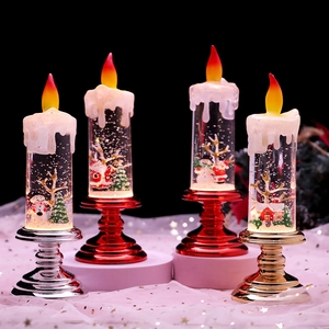 Set of four lighted Christmas lanterns with LED flames and glitter water interiors