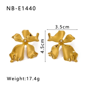 Detailed view of 18K gold plated flower earrings with dimensions 3.5cm by 4.5cm