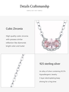 Detail of S925 sterling silver necklace with pink oval cubic zirconia pendant and chain