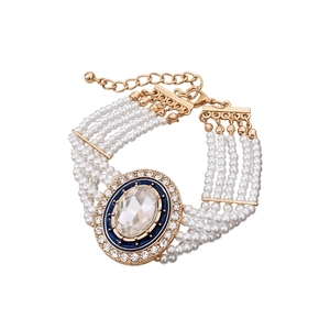 Multilayer pearl bracelet with oval crystal pendant in vintage golden enamel frame