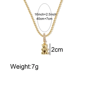 Gold bear pendant necklace on ball chain with dimensions 40+7cm and 2cm height