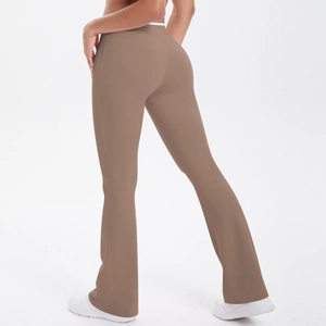 Detail view of high-waisted flare leggings in coffee brown with soft matte texture