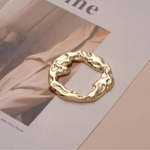 Minimalist gold irregular hammered metal ring buckle accessory for coats and scarves