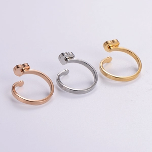 Three-piece set of heart-shaped open rings in gold, silver, and rose gold stainless steel