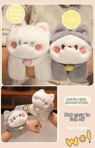 Close-up of cute plush cat slap bracelets with detailed embroidery and soft bells