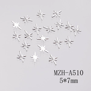 Détails macro des bijoux d'ongles étoiles en argent 5x7mm avec finition polie