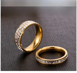 Macro detail of gold plated stainless steel rings with square cut cubic zirconia stones