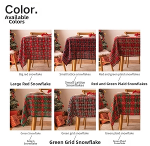Close-up of diverse red and green Christmas tablecloth patterns with festive snowflakes