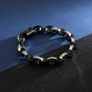 Close-up of geometric link bracelet in polished silver and black stainless steel