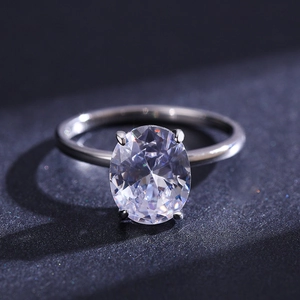 Elegant S925 silver ring featuring a large oval-cut clear zircon in a classic four-prong setting