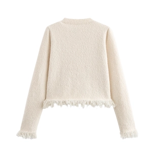 Beige knitted cardigan sweater with fringe details and tweed texture shown from the back