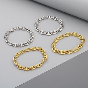 Golden and silver stainless steel pig nose link bracelets with lobster clasp closure