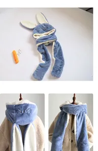 Detailed views of blue plush rabbit ear hood scarf with embroidery and soft white lining