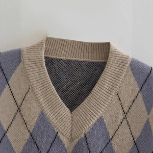 Women's V-neck argyle knit vest in blue and khaki with classic ribbed neckline detail