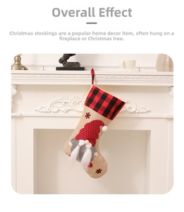Close-up of Nordic gnome Christmas stocking in red plaid burlap on a white fireplace