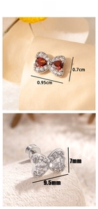 Detailed size view of titanium bow earrings showing 9.5mm width and 7mm height dimensions