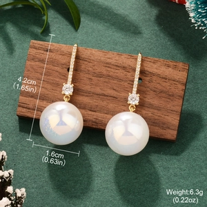 Detailed view of french vintage pearl earrings with dimensions 4.2cm length and 1.6cm width
