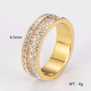 Anillo de tres filas de circonitas en acero inoxidable dorado, 6,5 mm y peso 4 g