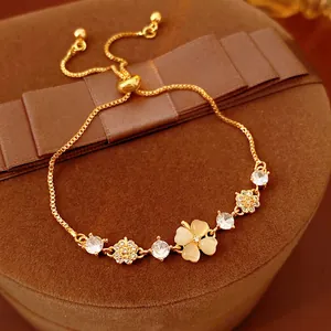 Gold plated opal flower bracelet with cubic zirconia and adjustable box chain link