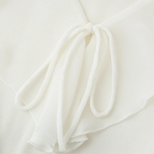White V-neck long sleeve blouse with ruffled edges and mesh lace-up tie detail