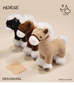 Three plush horses in black, dark brown, and tan with white manes and leather bridles