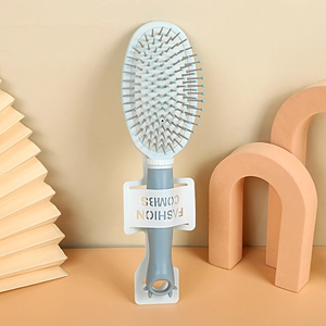 Portable blue air cushion hairbrush with round massage bristles and cat ear hanging hole