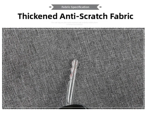 Close-up of scratch-resistant grey fabric texture for crossbody bags with key test