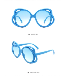 Front and 45-degree side view of oval sunglasses with blue frames and gradient lenses