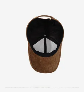 Detailed inner structure of brown corduroy baseball cap with durable black lining