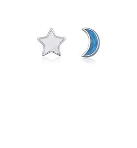 Macro shot of asymmetric s925 silver star and moon studs with blue enamel detail