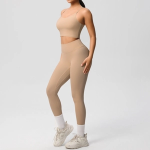 Side view of nude sports bra and high-waisted leggings set with brushed texture fabric