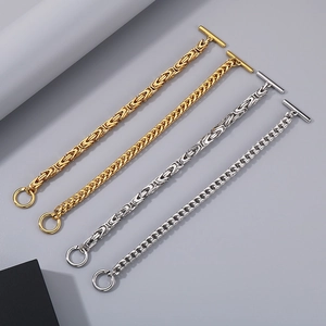 Detail of stainless steel byzantine and twist chains with OT toggle clasps in gold and silver