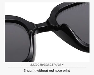 Macro view of black square sunglasses bridge showing snug fit and high-quality finish