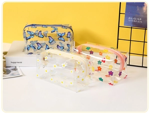 Three large capacity PVC clear makeup bags with butterfly and floral patterns for travel