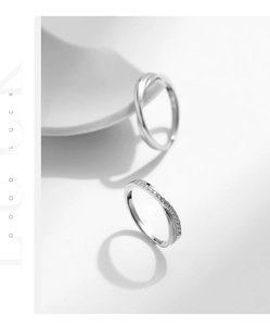 Macro detail of S925 sterling silver Mobius rings with intertwined pavé zircon setting
