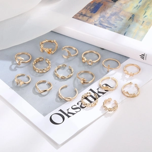 15-piece vintage gold ring set featuring butterfly, rose, and moon designs for women