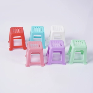 Set of six colorful miniature dollhouse plastic stools with anti-slip perforated design