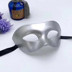Silver retro masquerade mask for men featuring a metallic finish and black satin ribbons