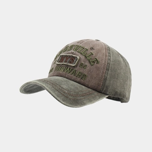 Close-up of vintage washed baseball cap with 3D embroidery and dual-tone stitching