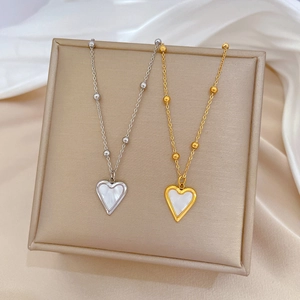 Titanium steel heart necklaces with mother of pearl in gold and silver finish