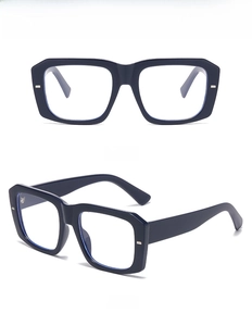 Detail view of square blue light blocking glasses with stylish rivet accents